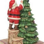 Babbo Natale che Decora Albero - Jim Shore